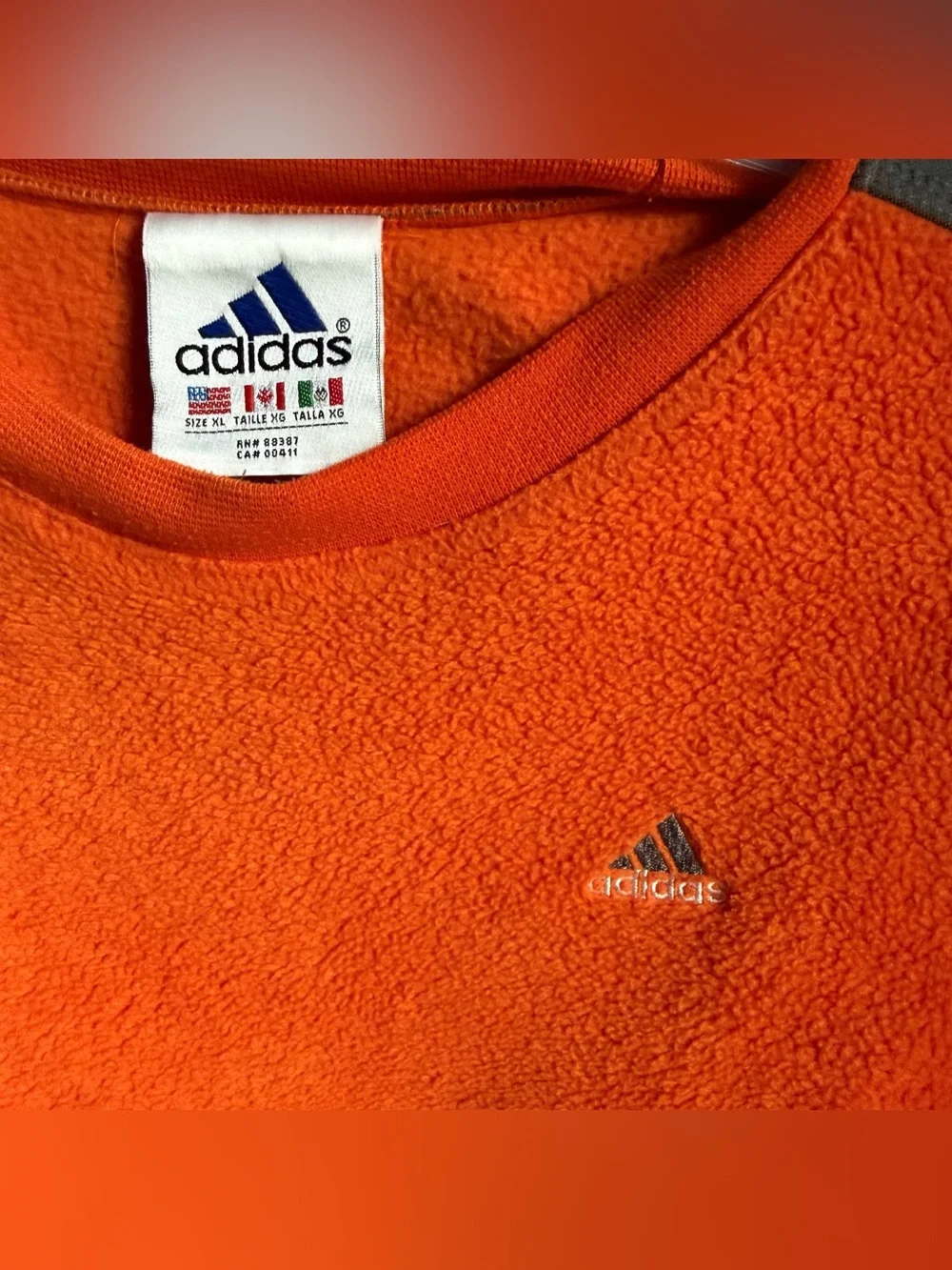 90’s Adidas Orange Fuzzy Sweatshirt Size XL with Gray Nylon Shoulders